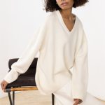 latest design women v neck solid color cozy knitwear irregular elegant loose long sleeve sweater